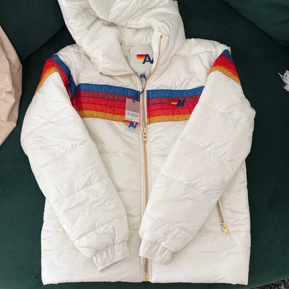 NEW! Aviator Nation White Jacket with signature rainbow wrap around back logo.